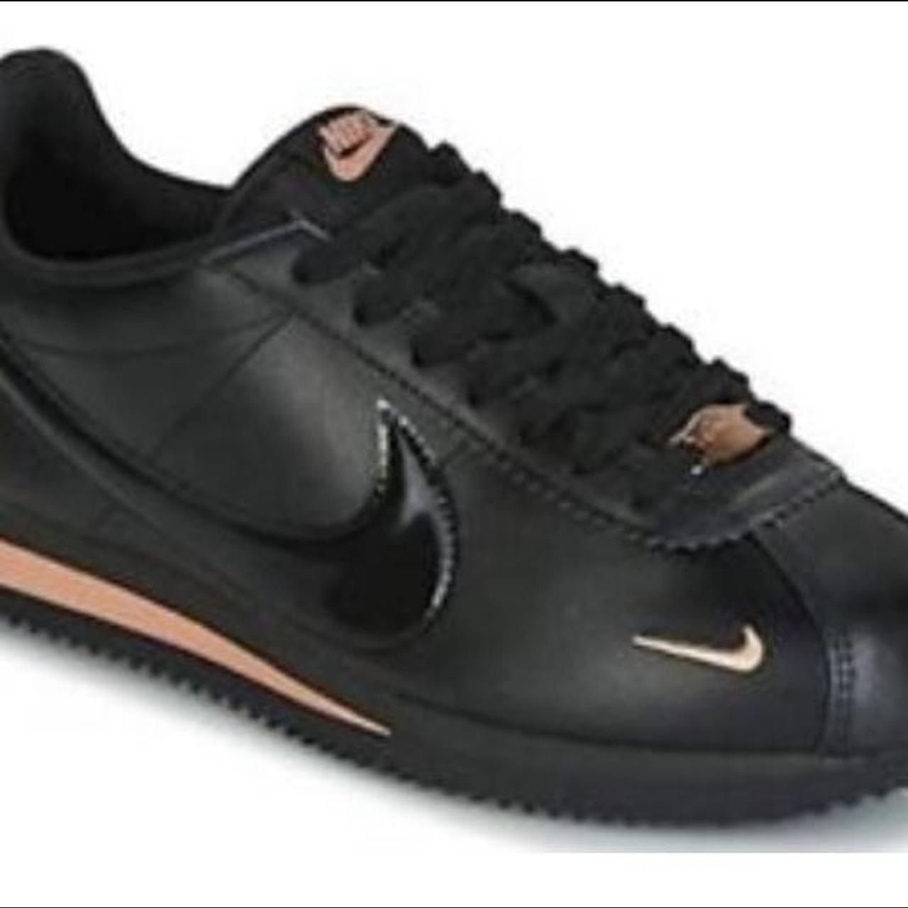 Nike Cortez trainers in black and rose gold