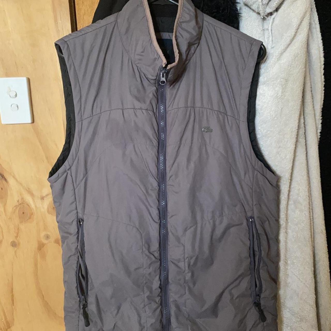Super cool and rare Lacoste charcoal puffer vest, in... - Depop