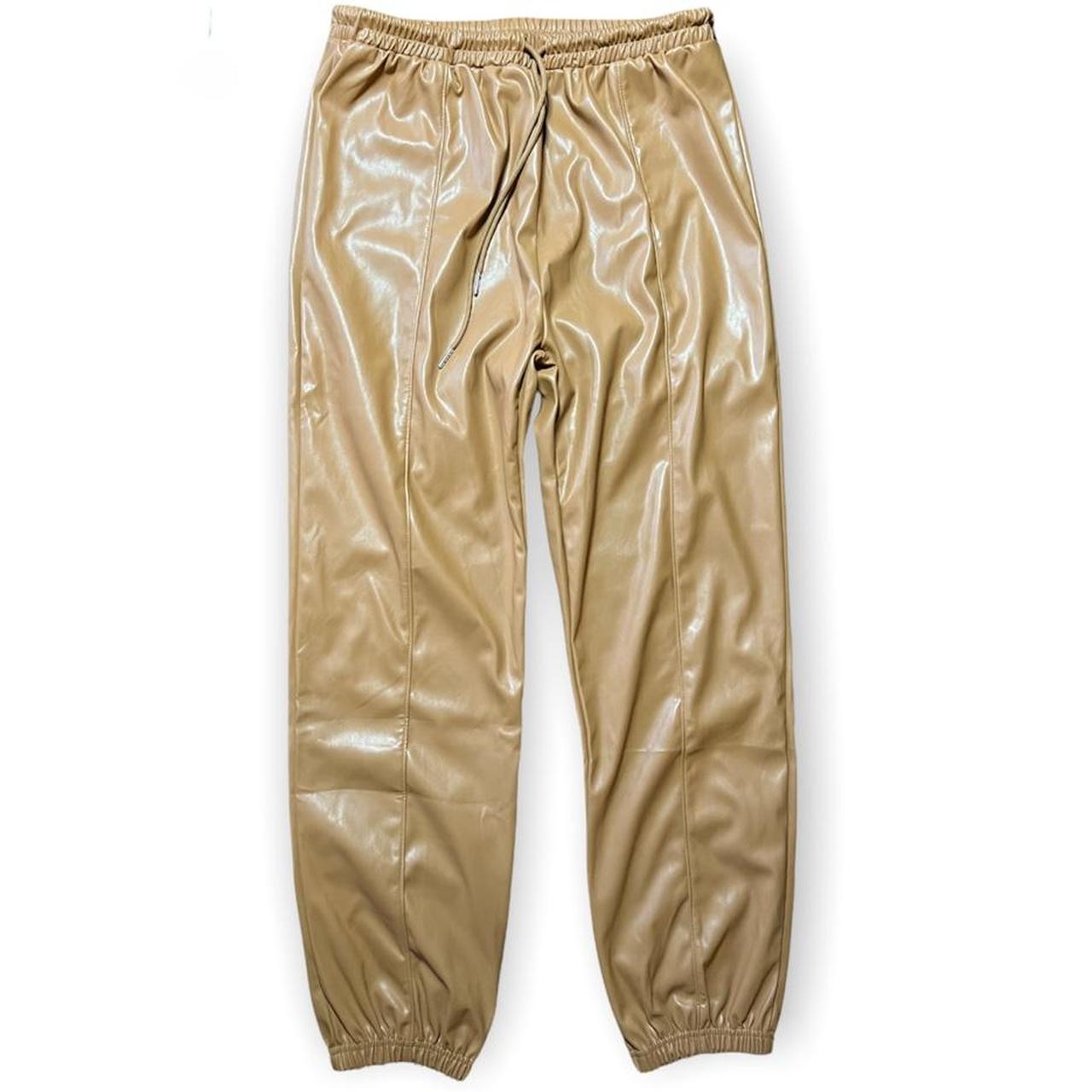 Camel colored faux leather joggers from Shein in a... Depop