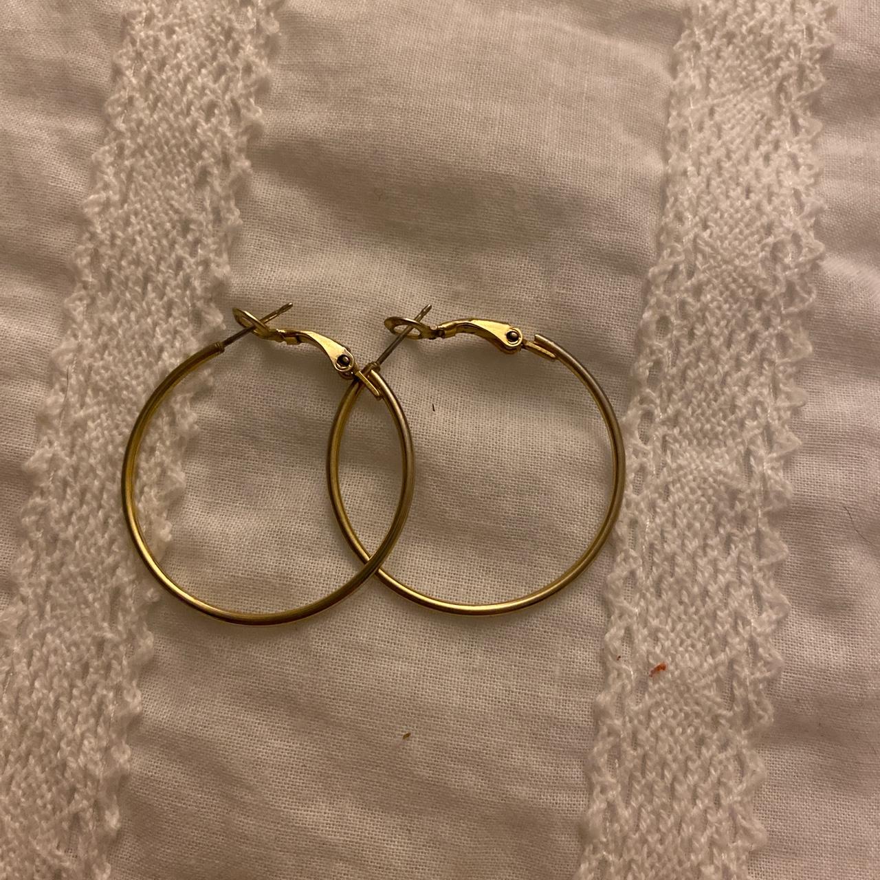 Cute pair of gold hoops look like the brandy... Depop