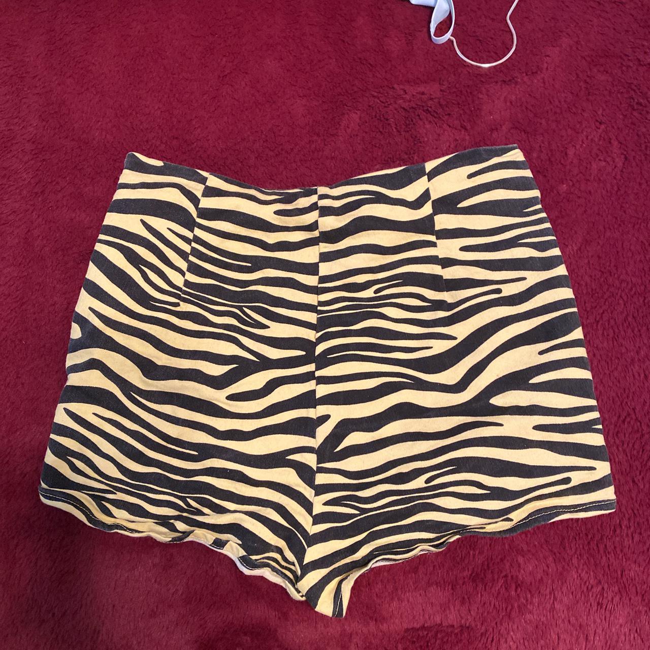 yellow zebra print skort!! worn twice, and i love... Depop