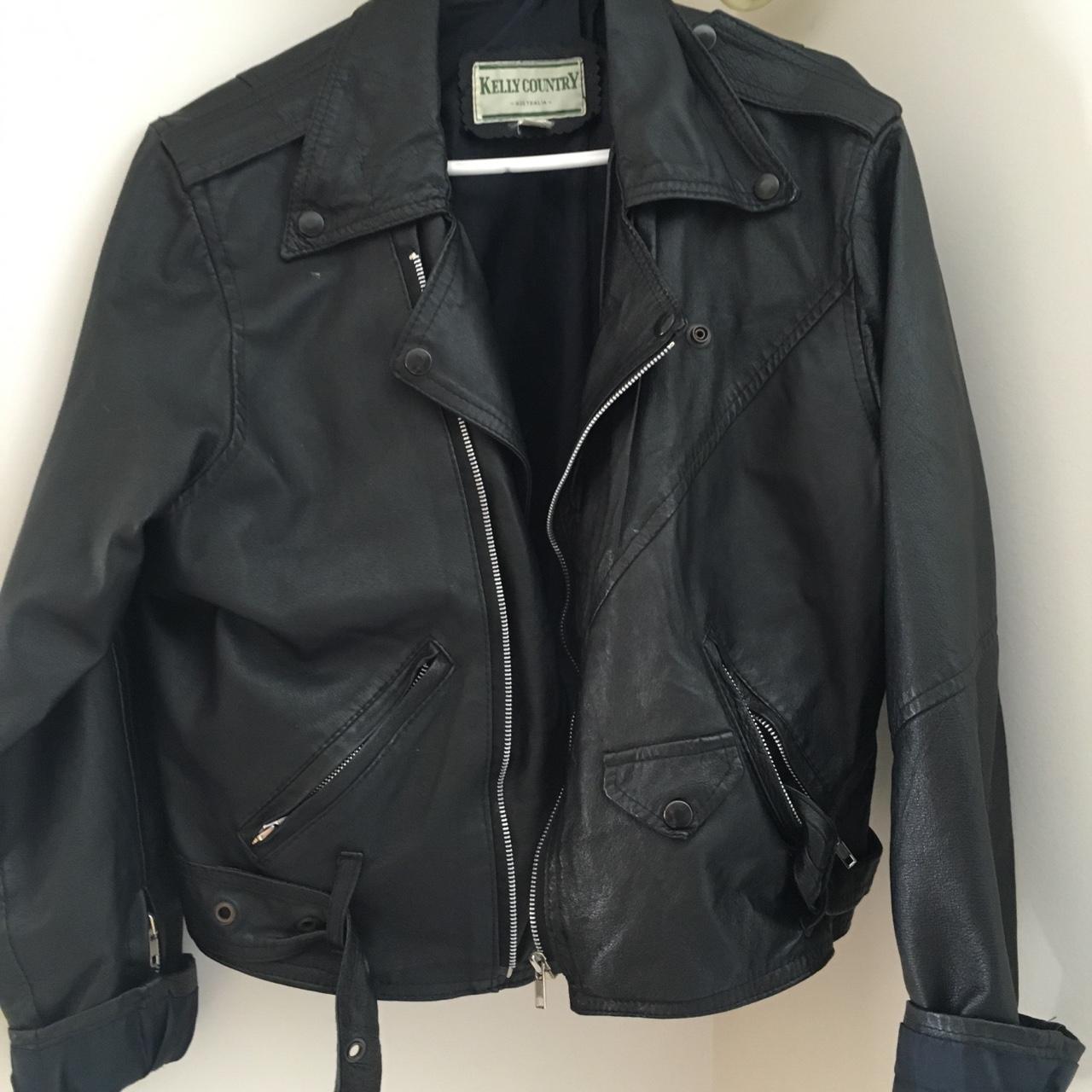 oversized worn leather jacket, would fit a women's... - Depop