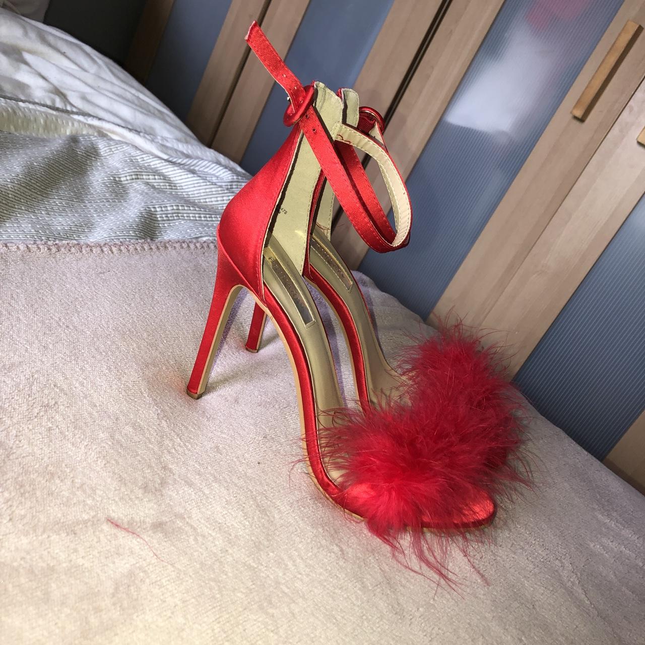 Red best sale fluffy heels