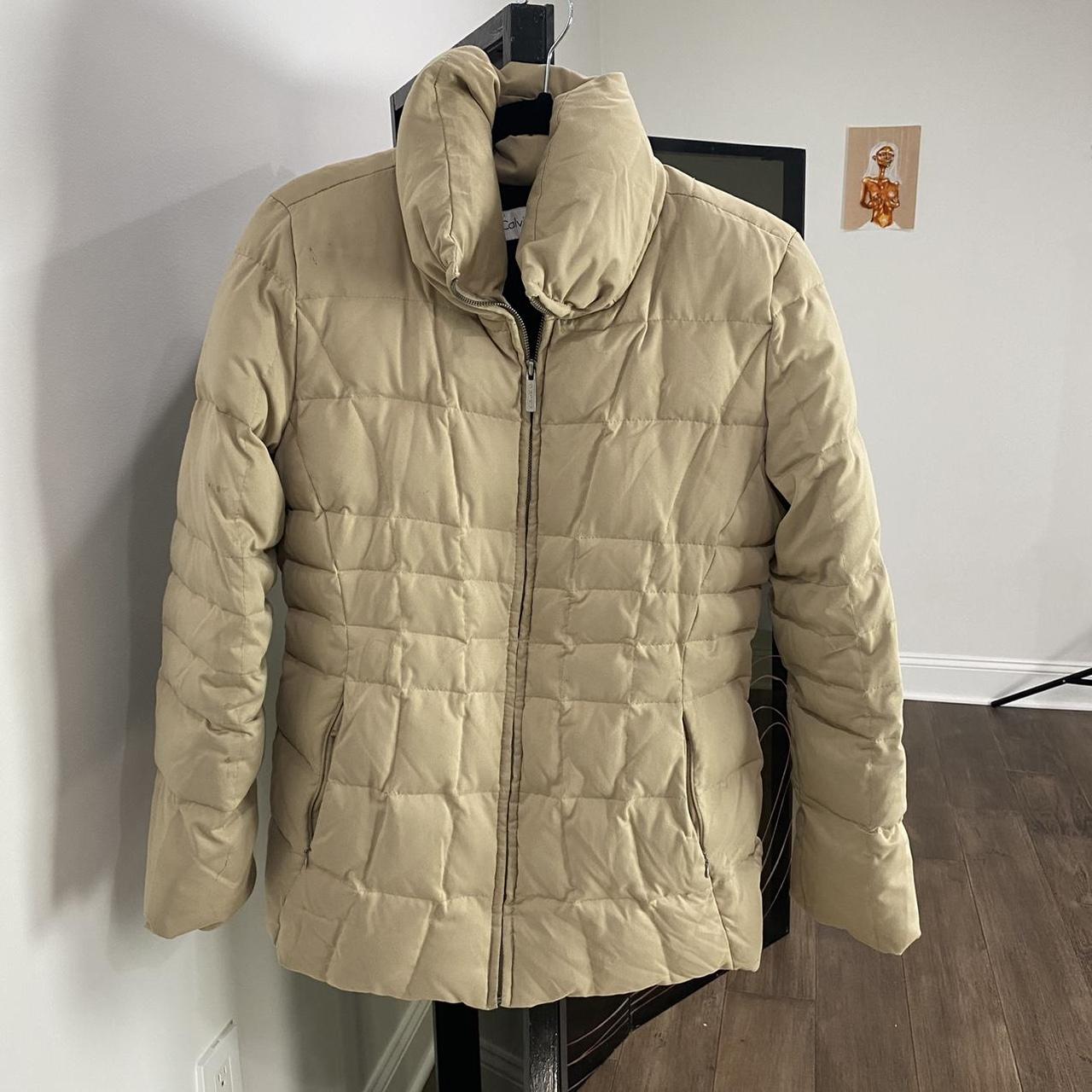 nude north face puffer