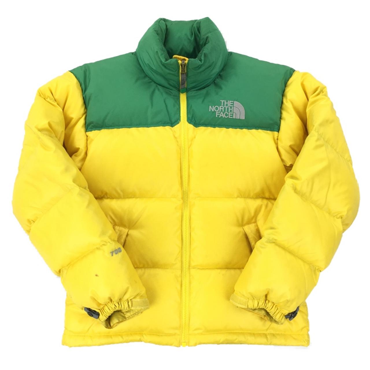 green and yellow north face jacket