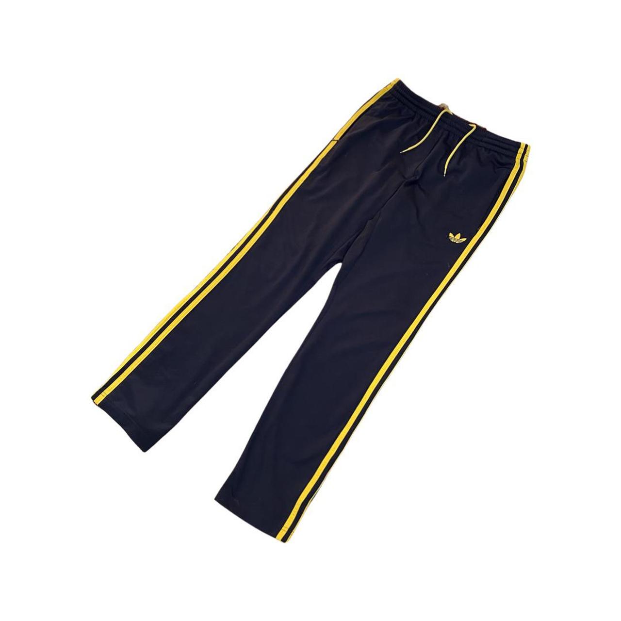 Adidas track pants - size medium - mens black yellow... - Depop