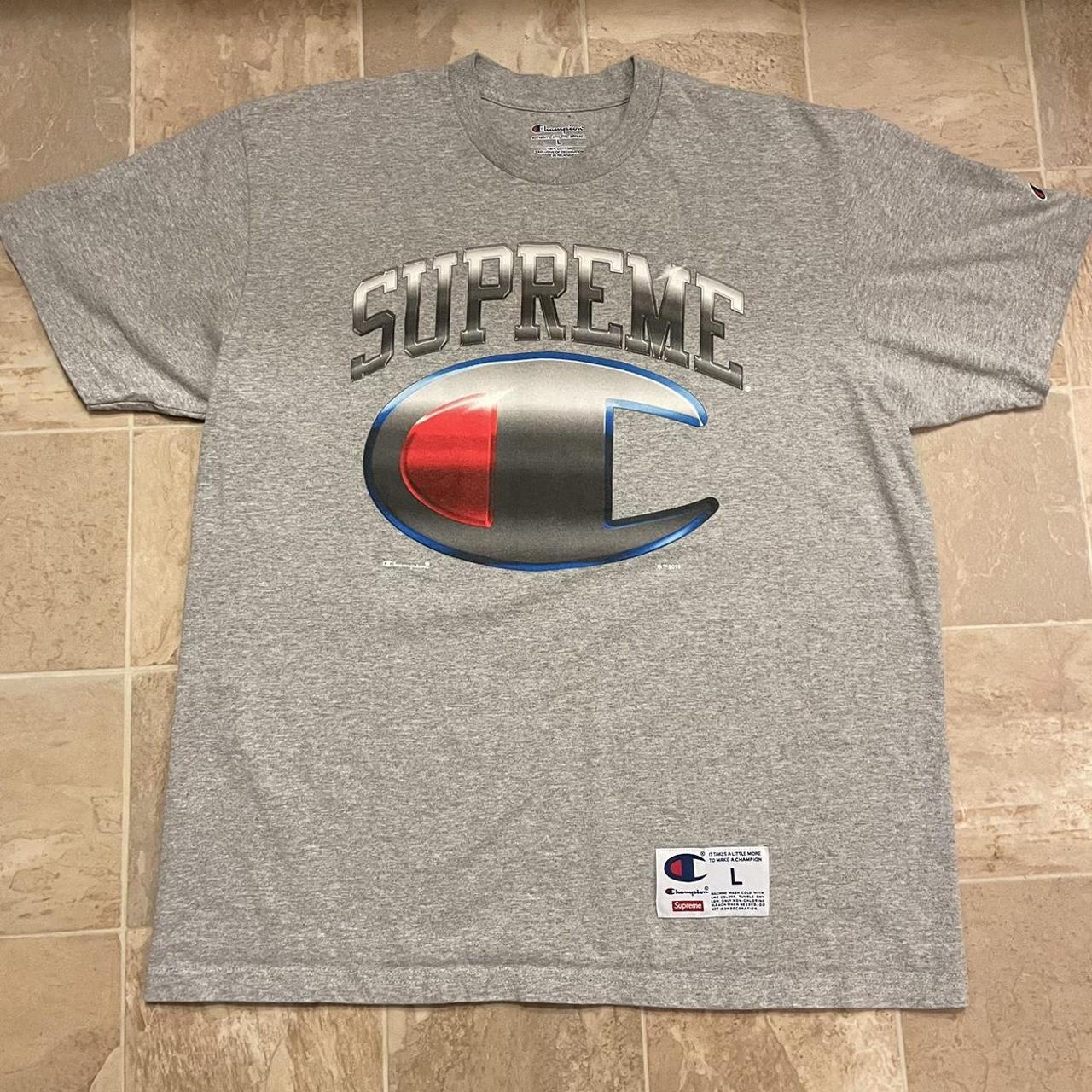 Supreme champion clearance tee