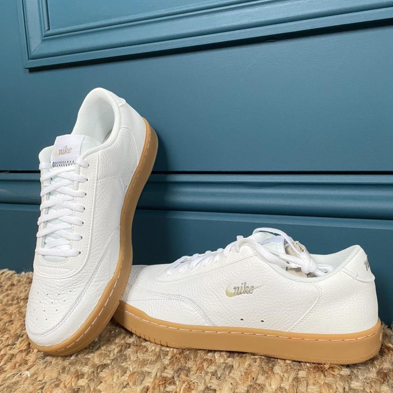 nike court vintage trainers cream