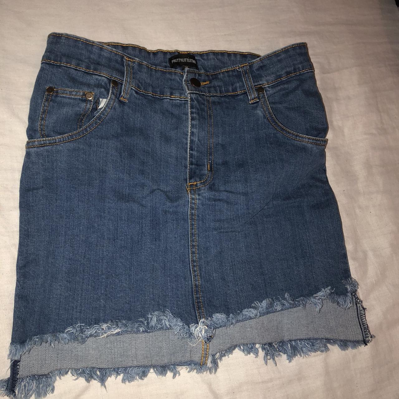 Blue denim skirt which is frayed at the ends. Size... - Depop