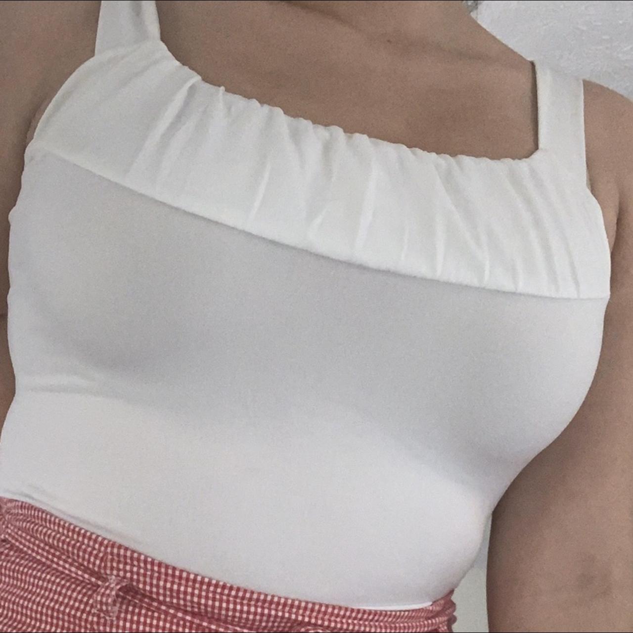 white tank, almost reminds me of the Unif Becca top... - Depop