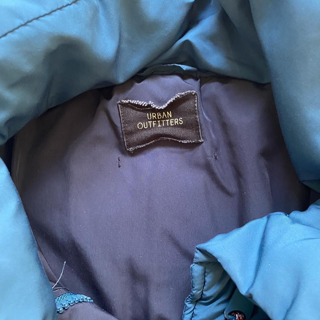 urban outfitters blue puffer jacket coat, colour is... - Depop