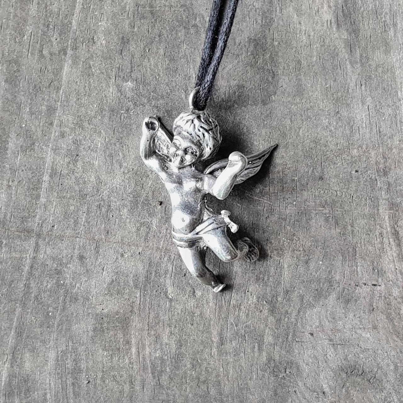 Silver cherub store necklace