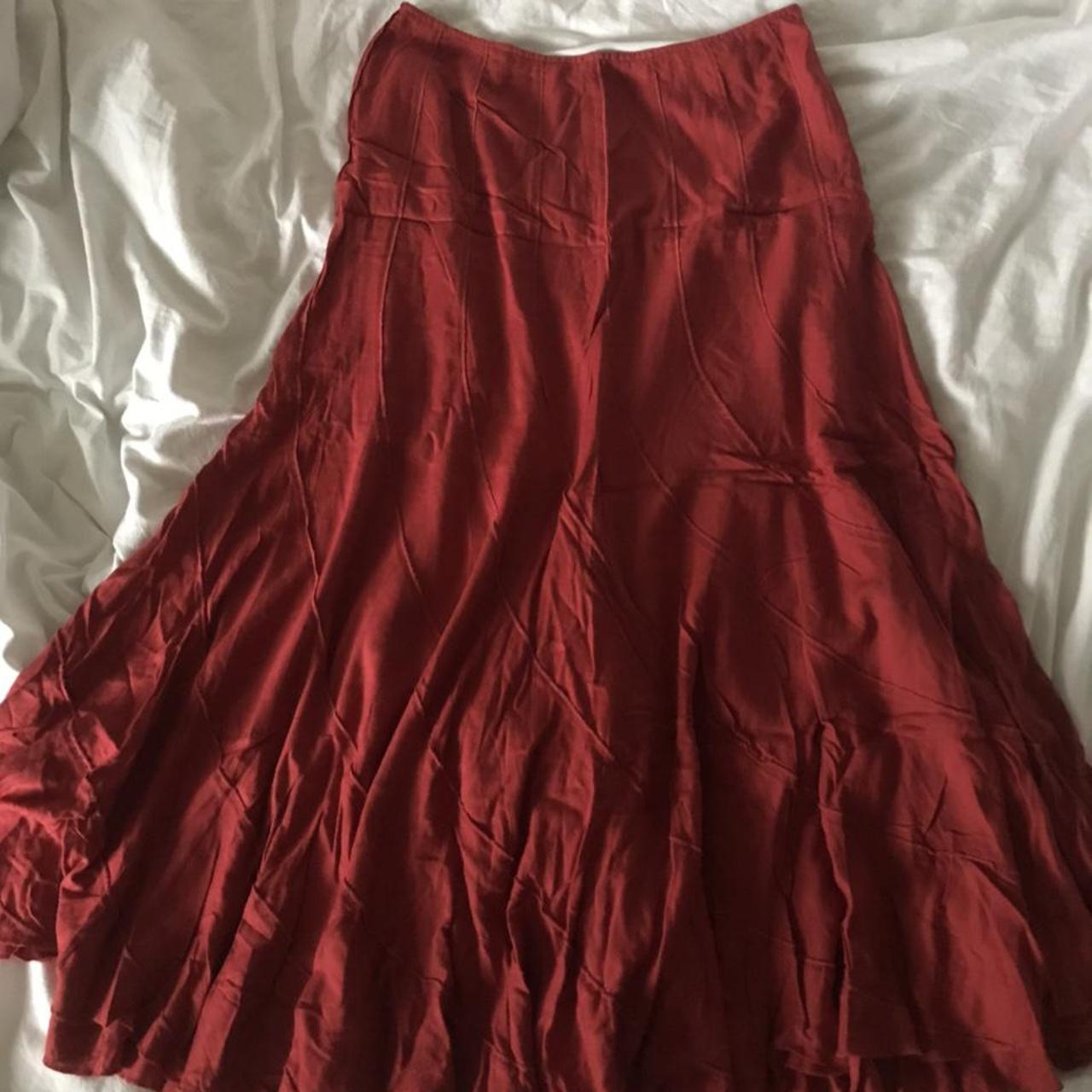 Beautiful red maxi skirt with outside stitching... - Depop