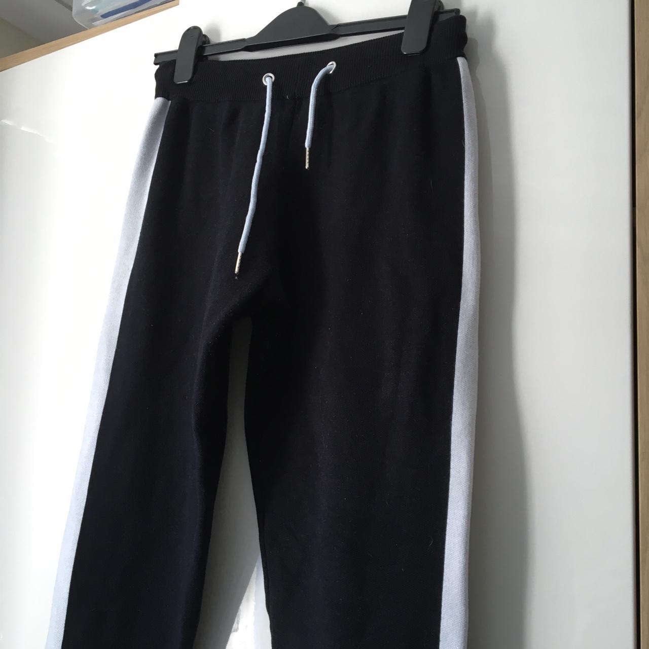 Maniere de voir joggers Black with white stripe on... - Depop