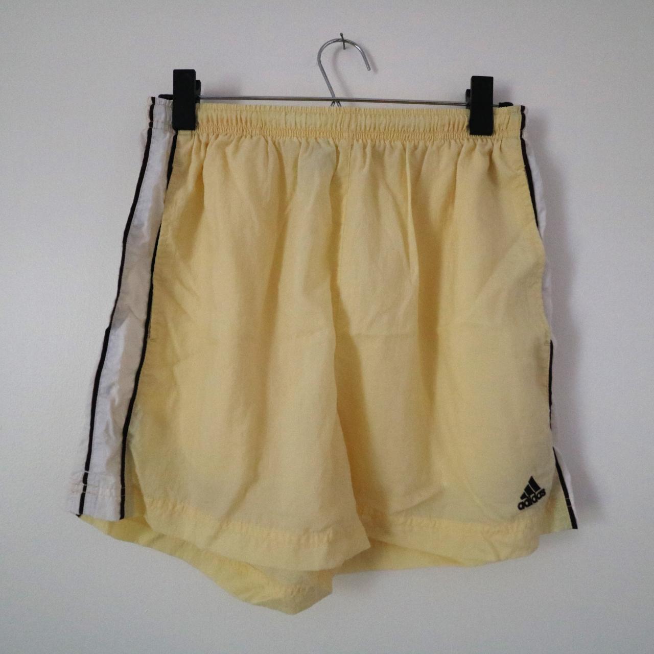 pastel yellow adidas shorts