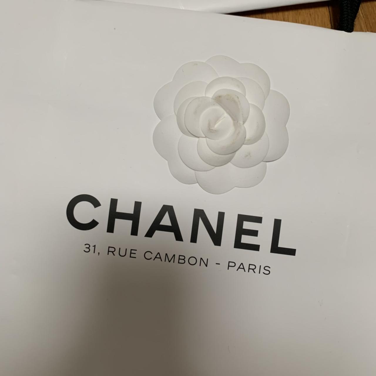 authentic chanel white paper bag with one of the - Depop