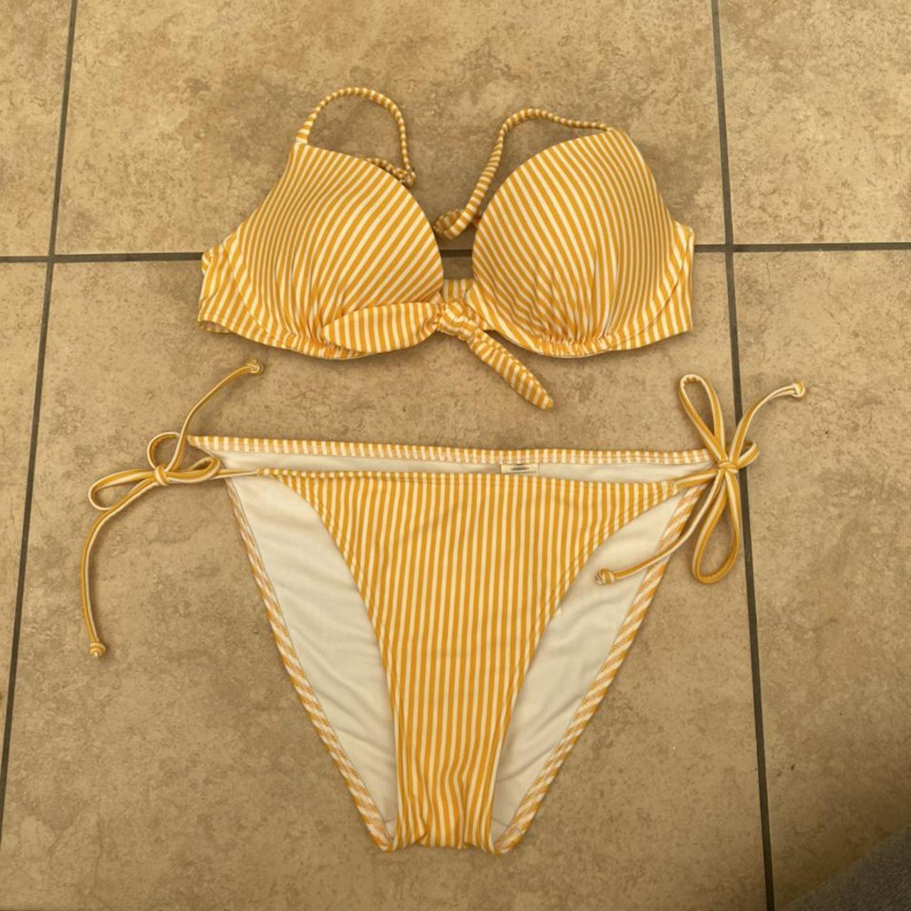 Yellow striped hollister bikini, worn once Padded... Depop