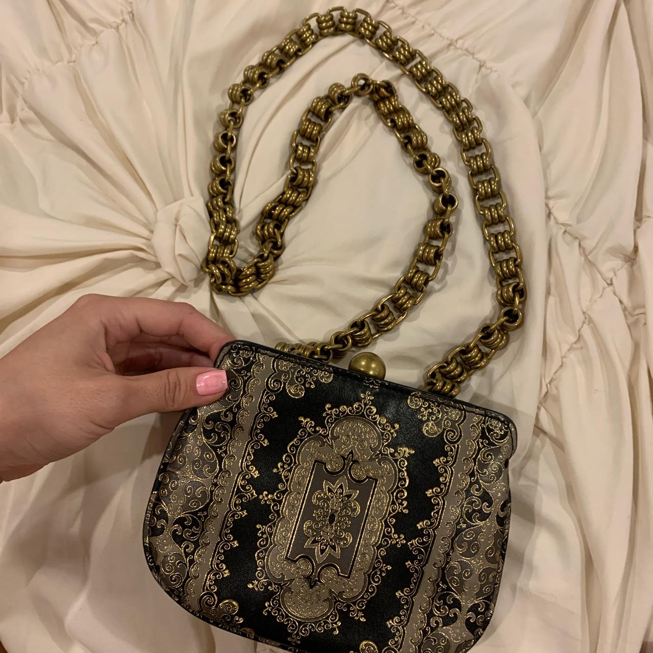 Gothic baroque style black and gold Tory Burch side - Depop
