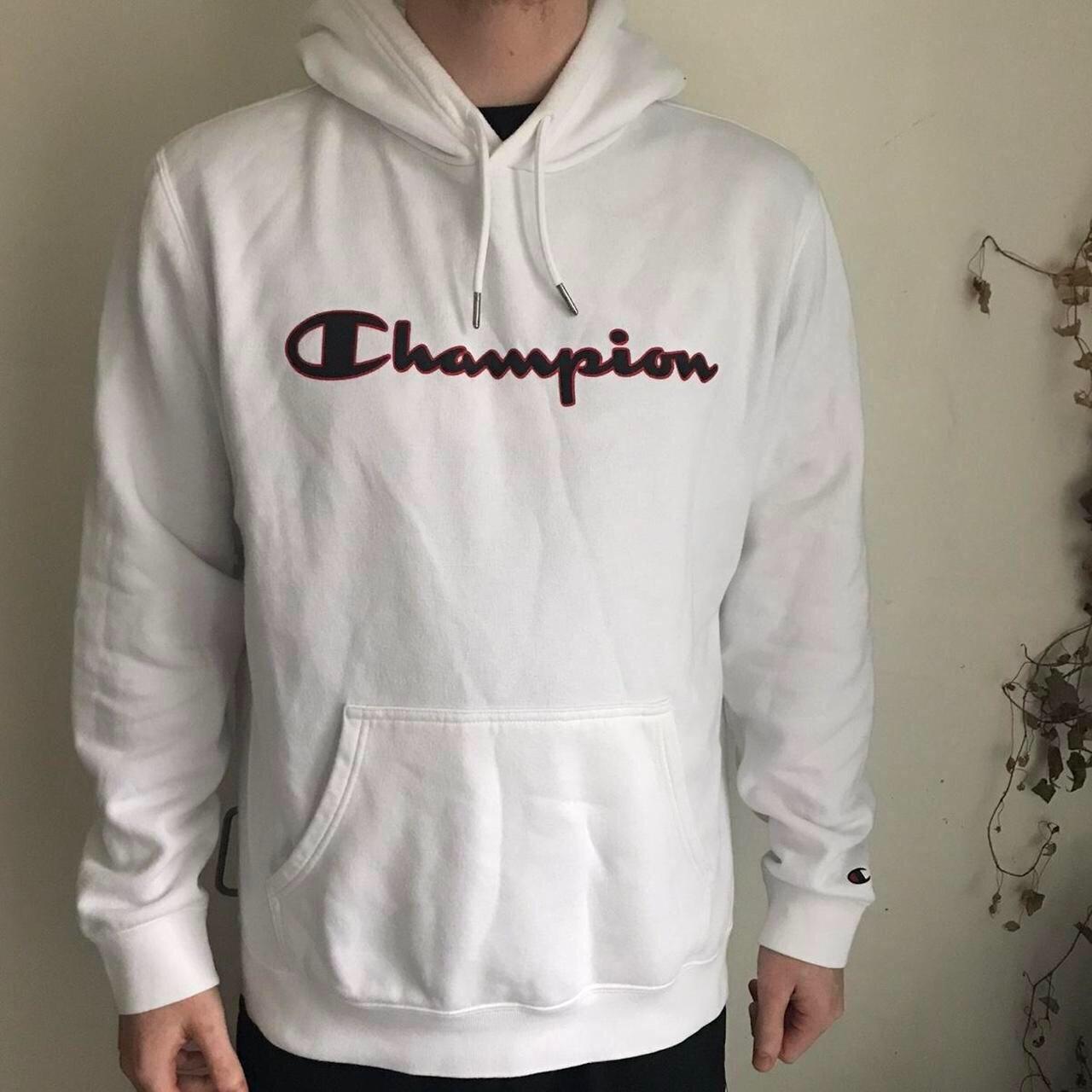 white champion hoodie with black writing