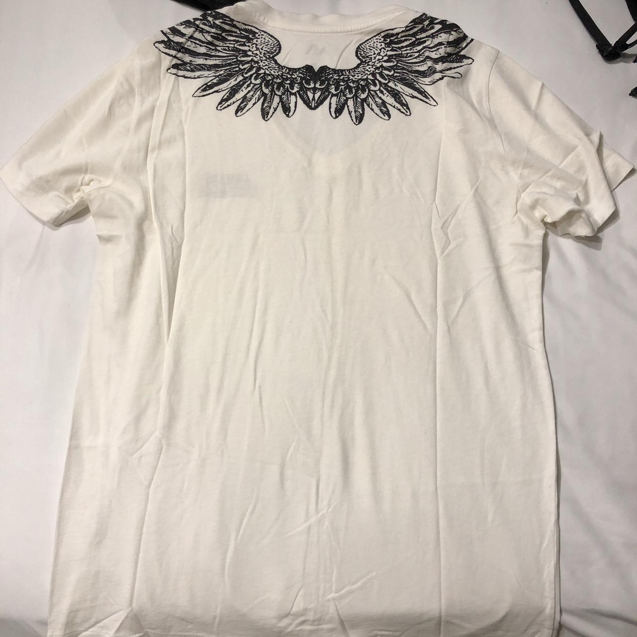 White v neck with wings Armani exchange T shirt Depop