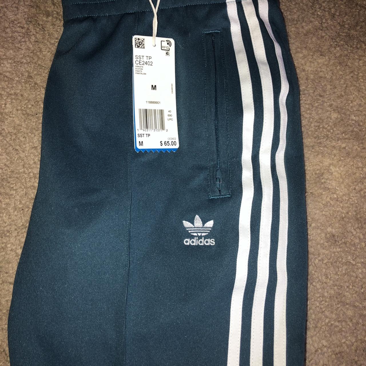 New with tags adidas pants. Teal, -