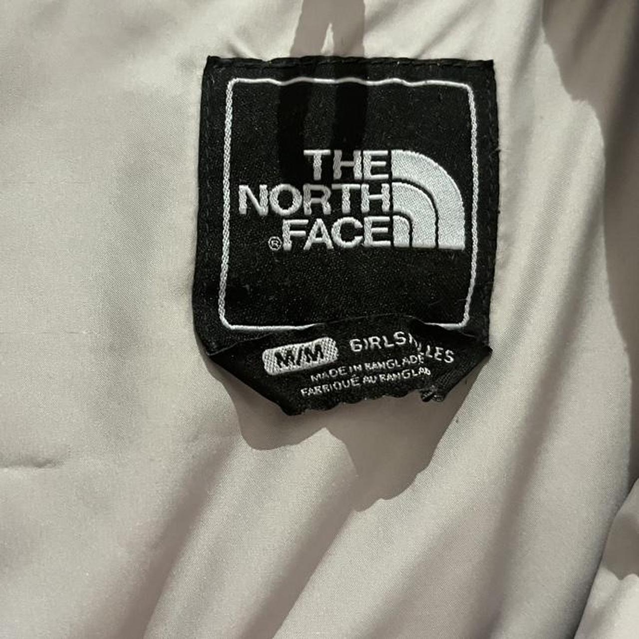 Pink north face puffer jacket, has a few signs of... - Depop