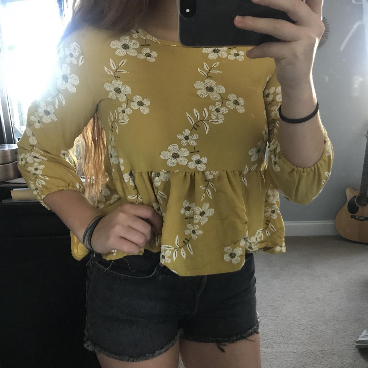 yellow flowy shirt