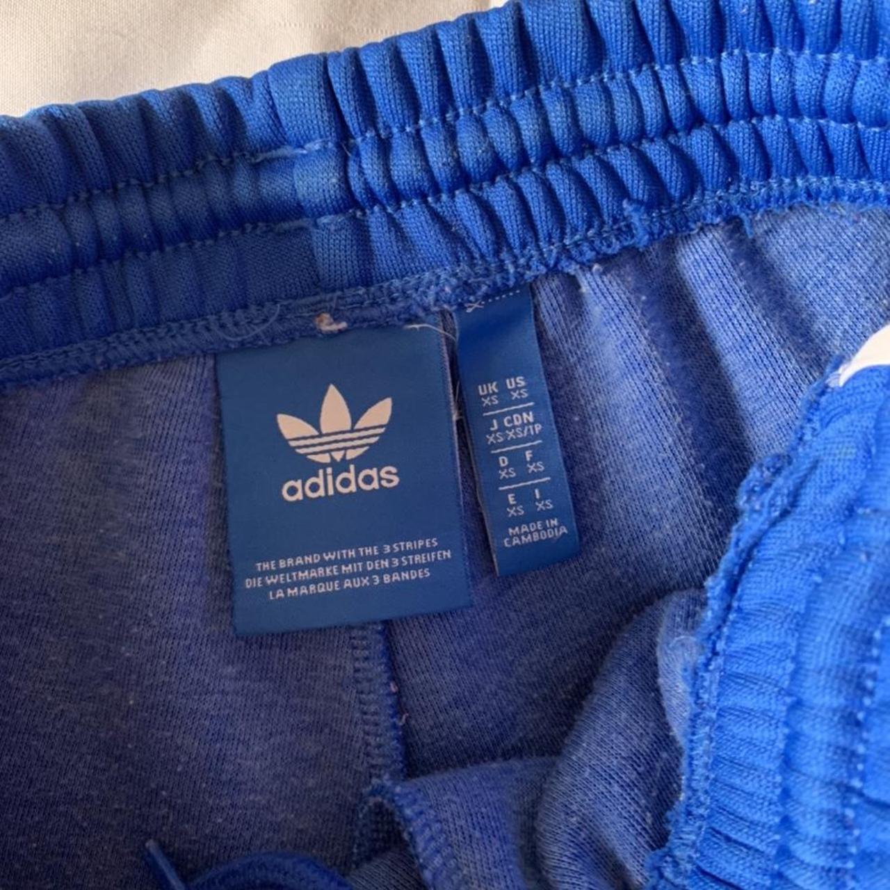 Blue adidas tracksuit bottoms Minor flaws as shown... - Depop