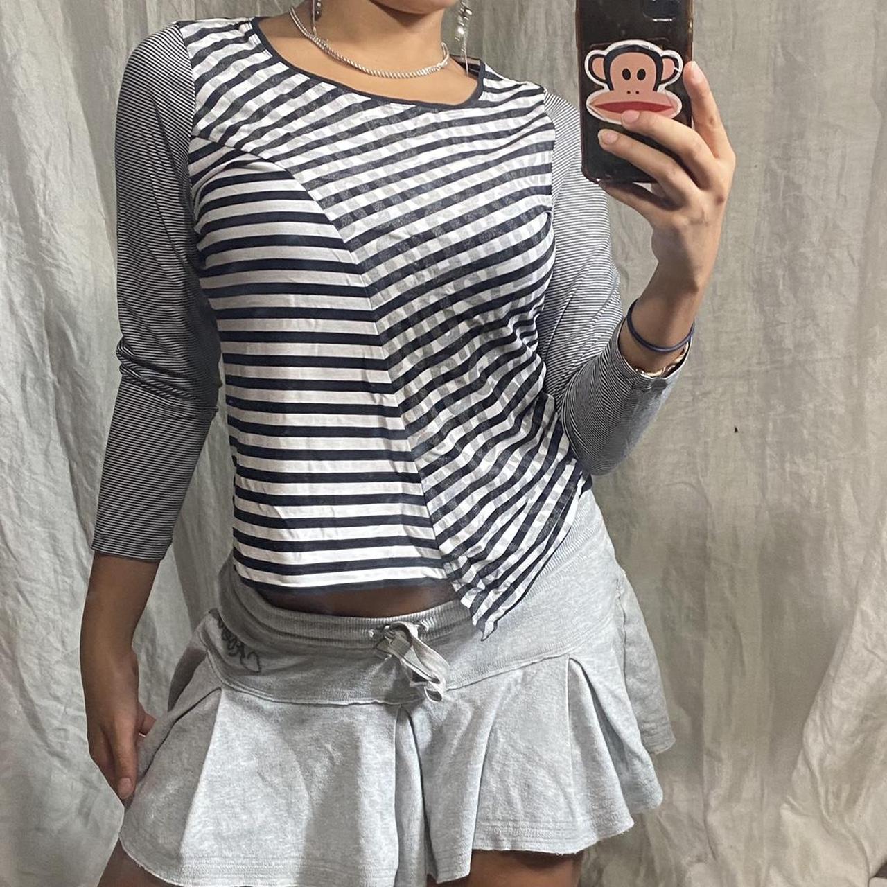 Striped black and white asymmetric front topwith... - Depop