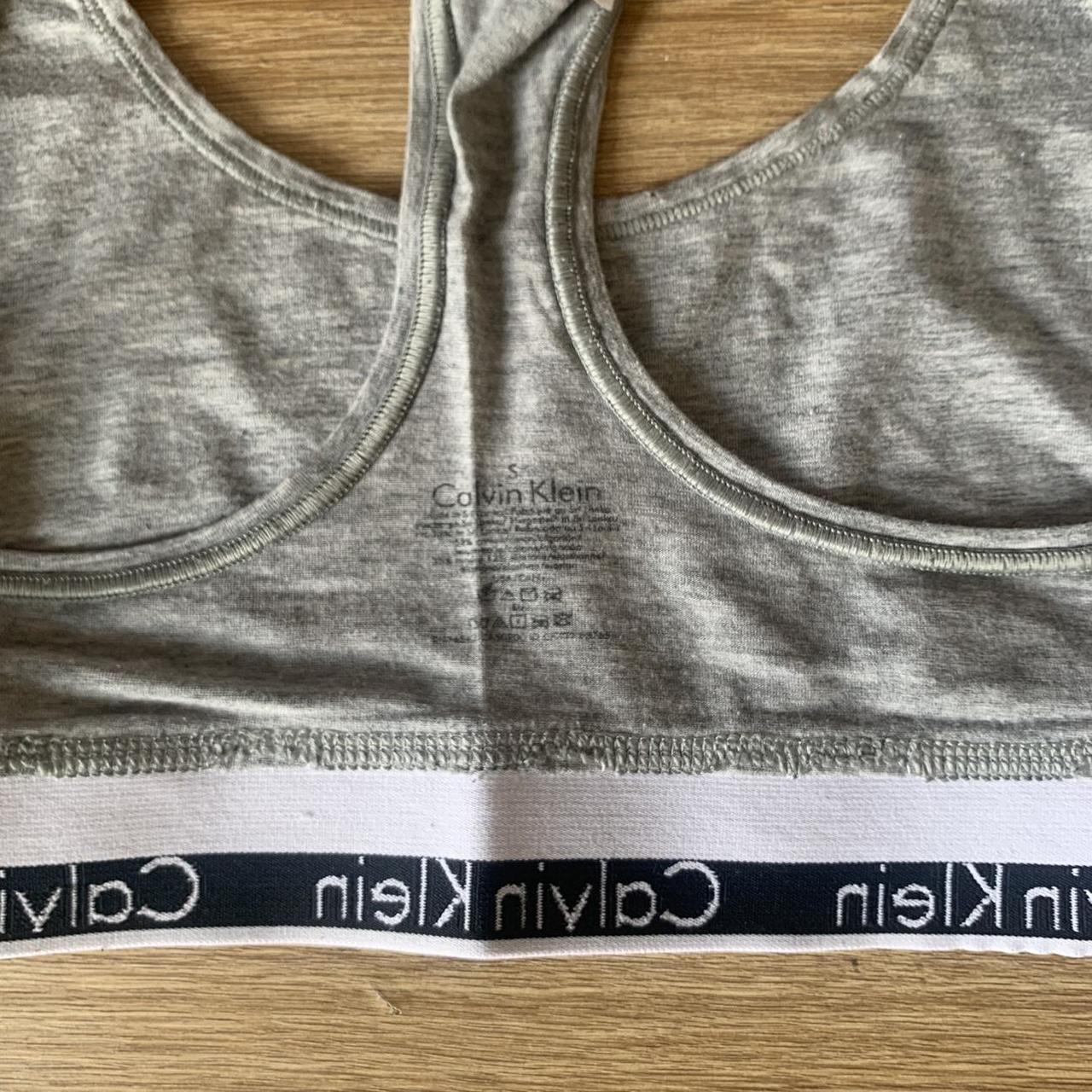 Calvin Klein grey sports bra size small excellent - Depop