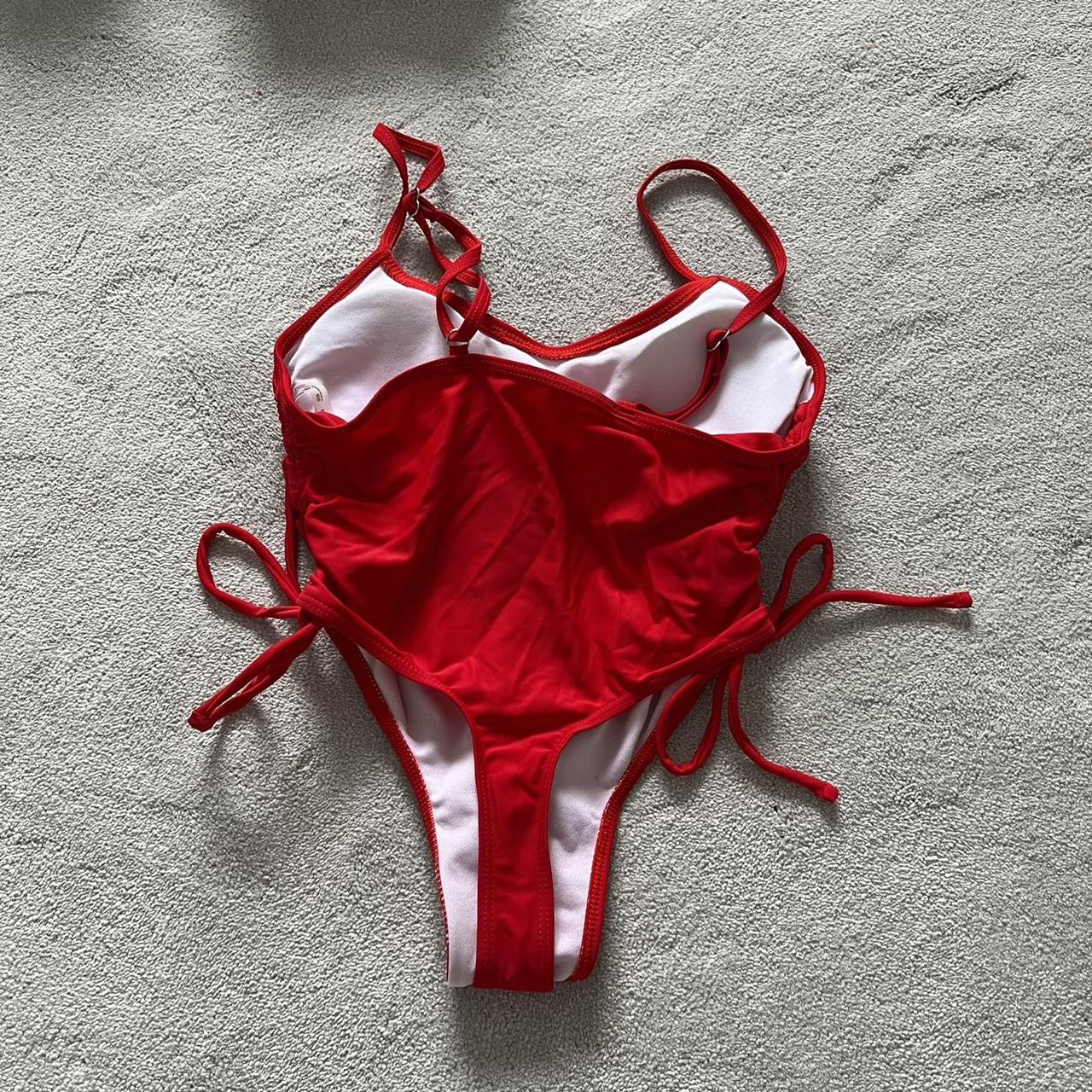 Beautiful red swimsuit with ruched tie on each side... Depop