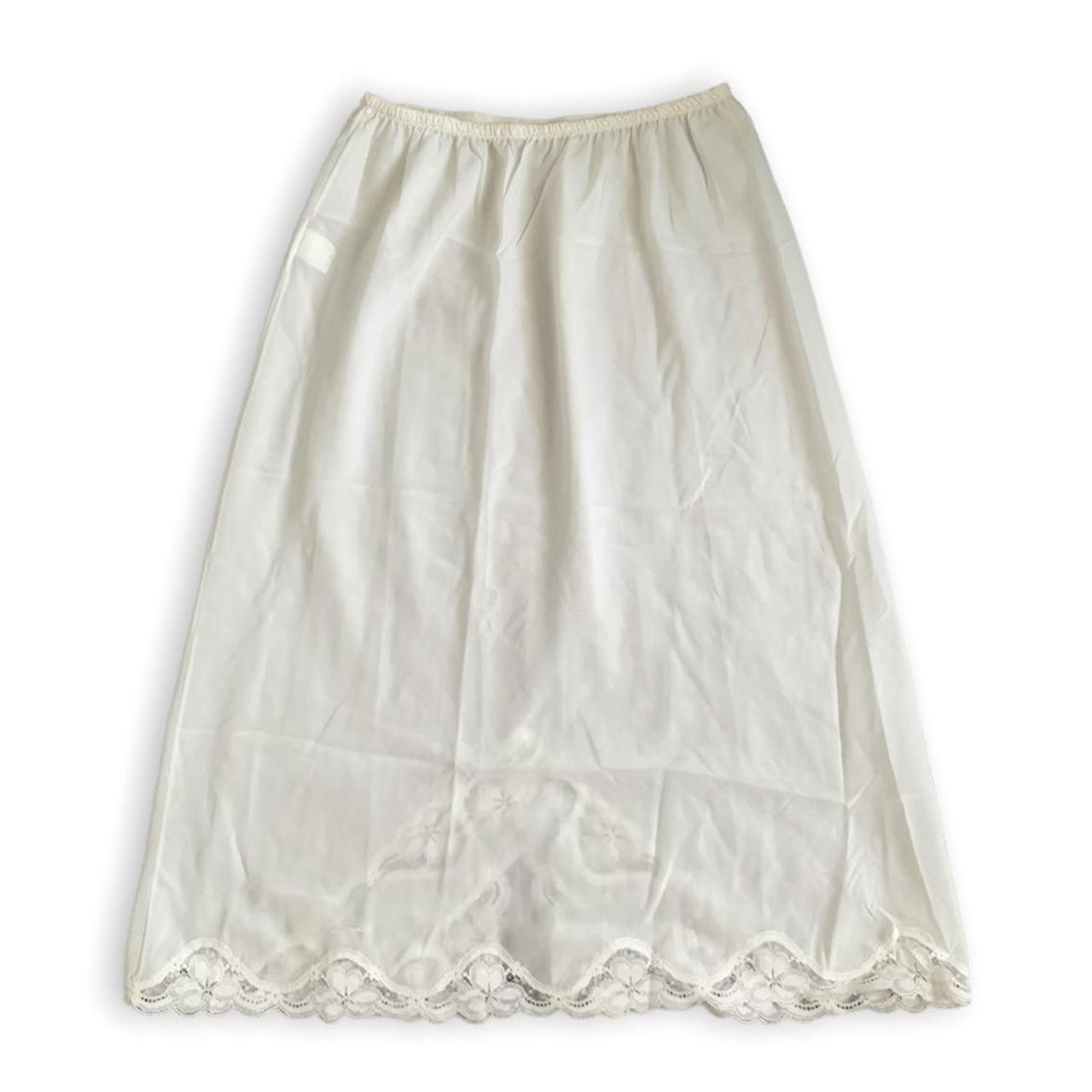 vintage white silk slip skirt with lace trimming on... Depop