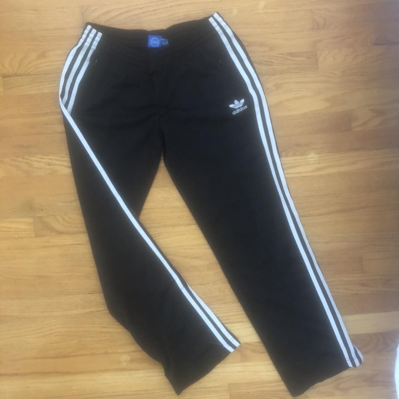 Adidas classic 3 stripe track pants with zipper at. Depop