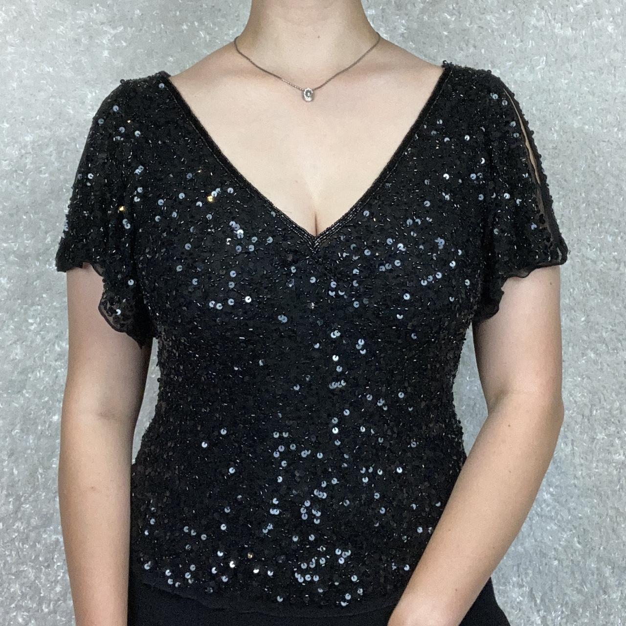 Stunning black beaded top covered in sequins