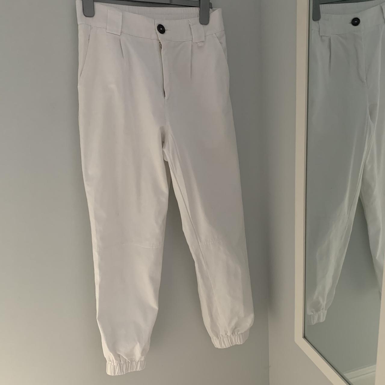White cargo pants. Cuffed at the bottom. Did come... Depop
