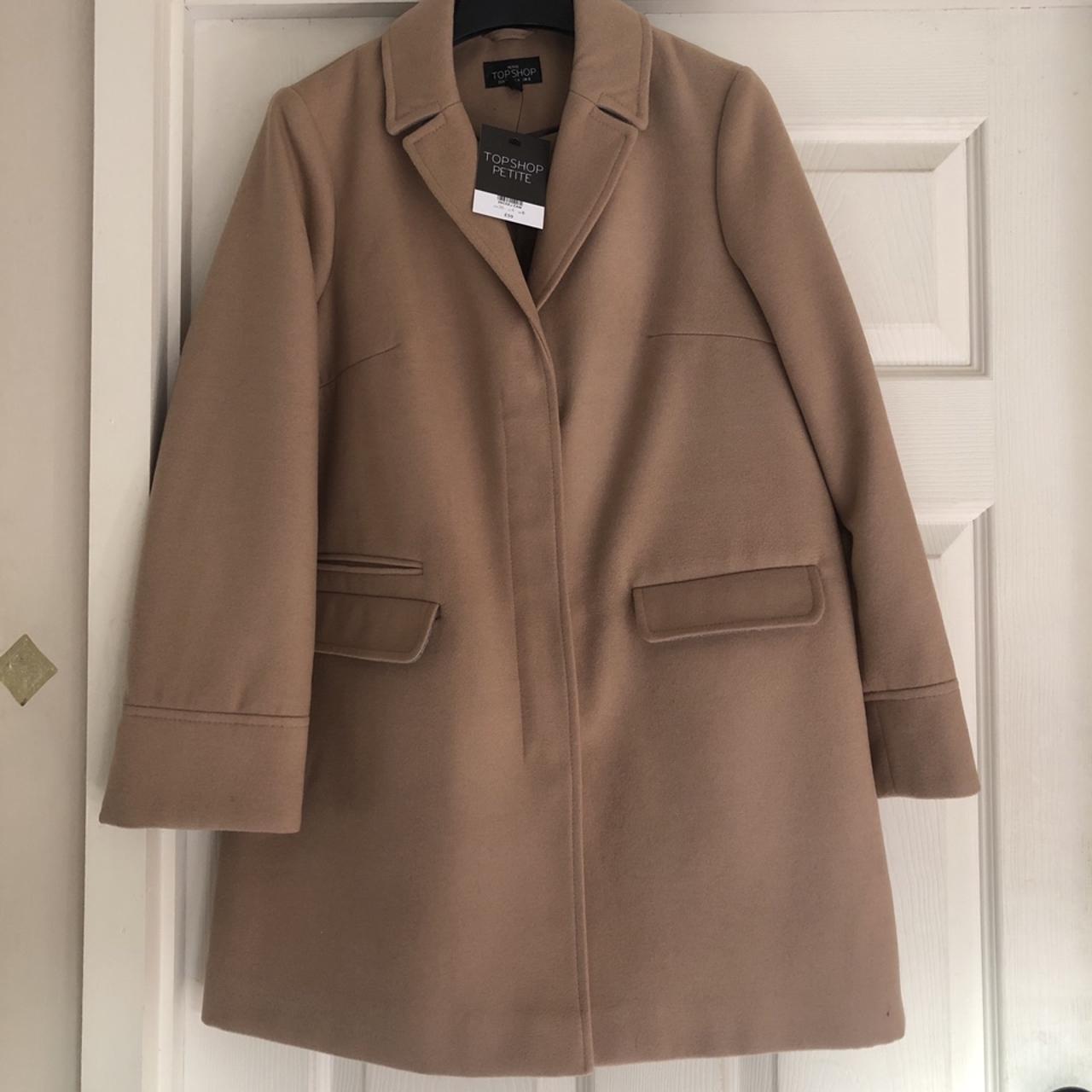 Brand new with tags. camel coat. Petite size... Depop