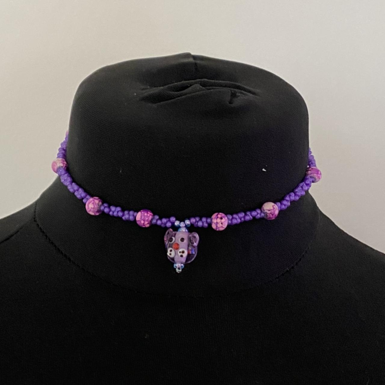 Super cute glass bead purple necklace Toggle... Depop