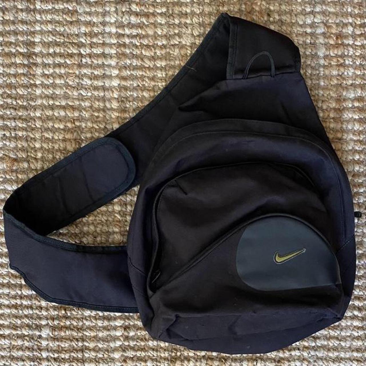 Nike strap on (bag) Vintage Black Swoosh Nike Sling... - Depop