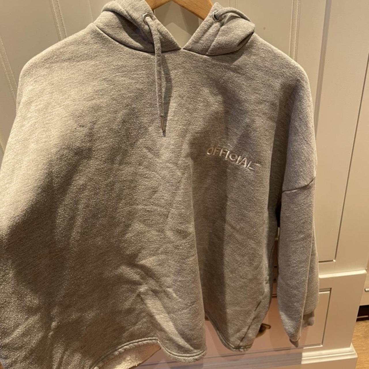 Grey ASOS official hoodie Label has been cut out... - Depop