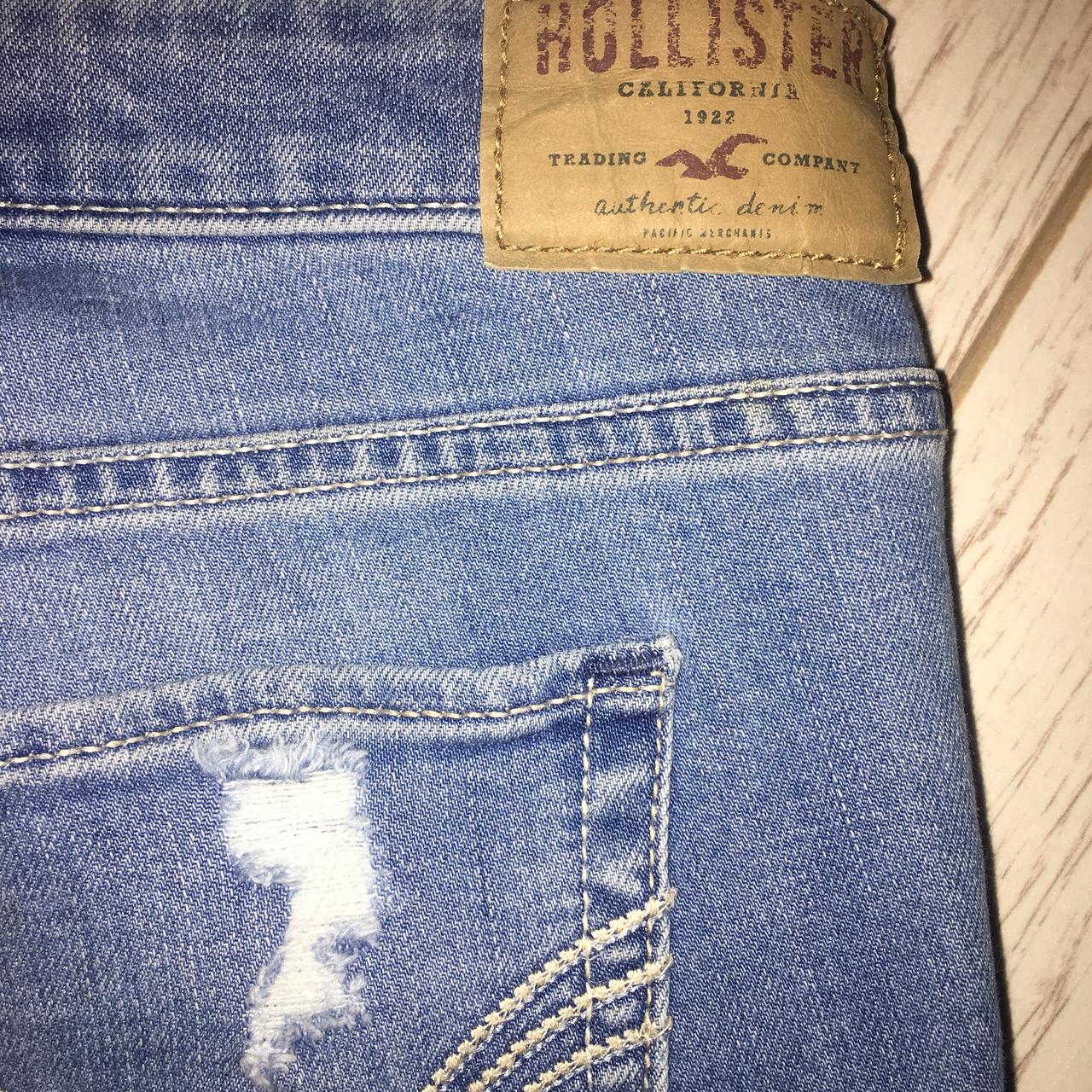 Hollister jeans with rips on store the back