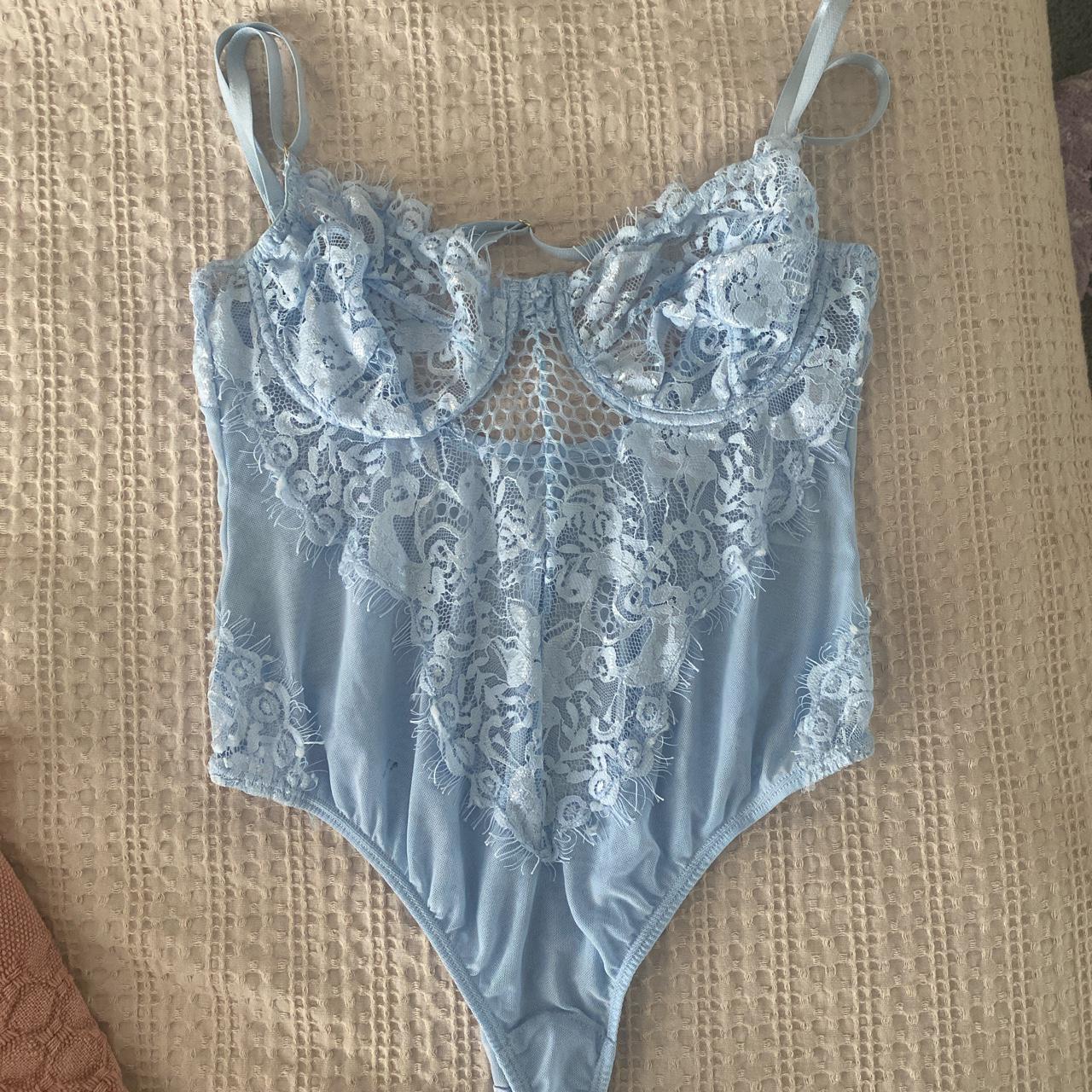 Baby blue lace corset style body suit Has small... Depop