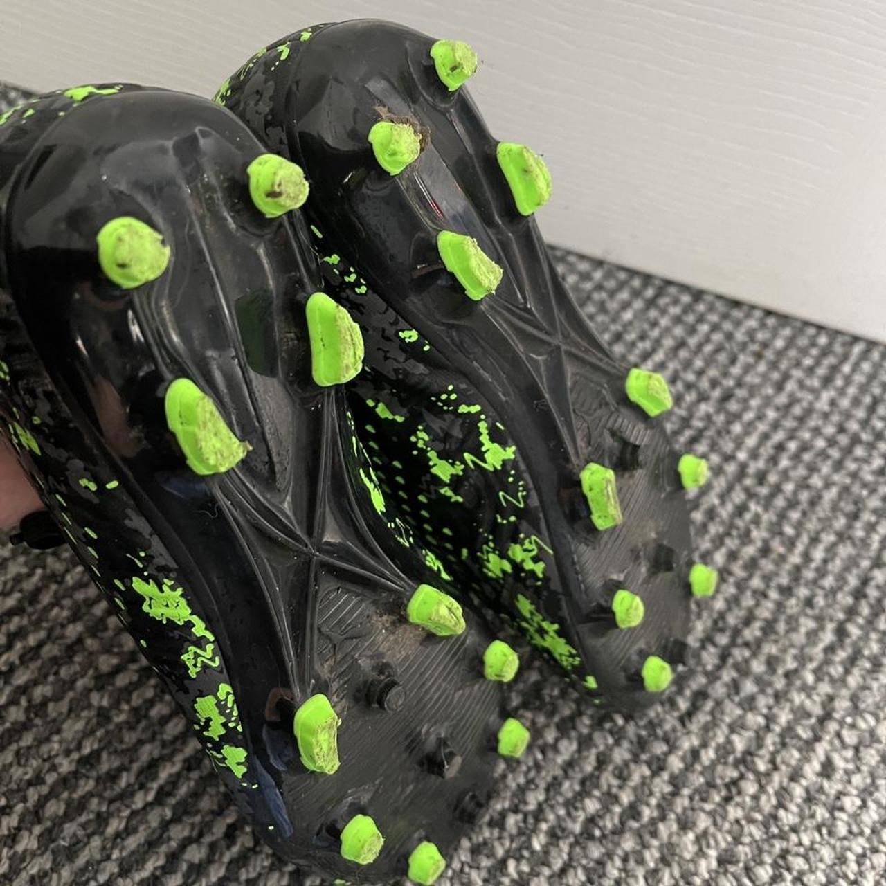 Kids puma black and bright green football boots.... Depop