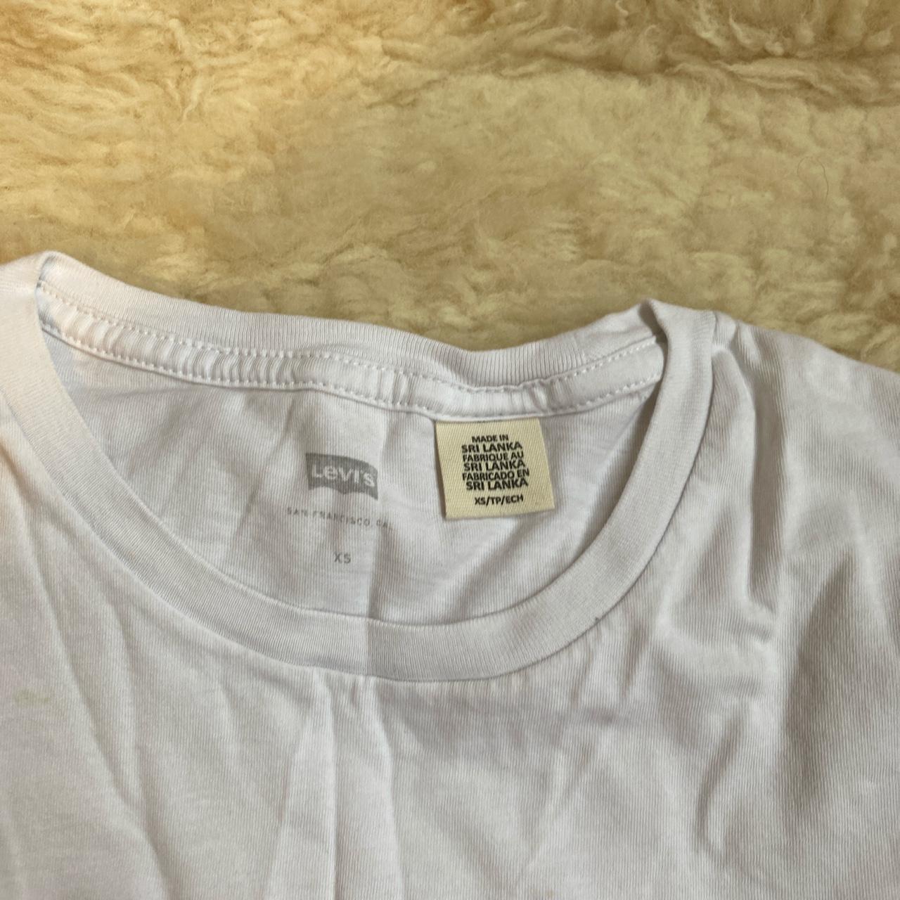 Basic levis white top red logo🤍 Size: XS ♡ message... - Depop