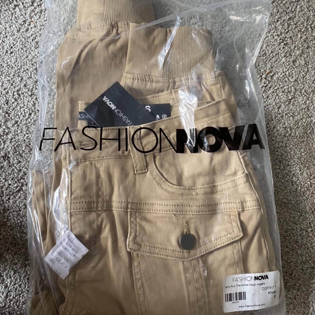 Fashion Nova khaki pants cuffed at the bottom with... Depop