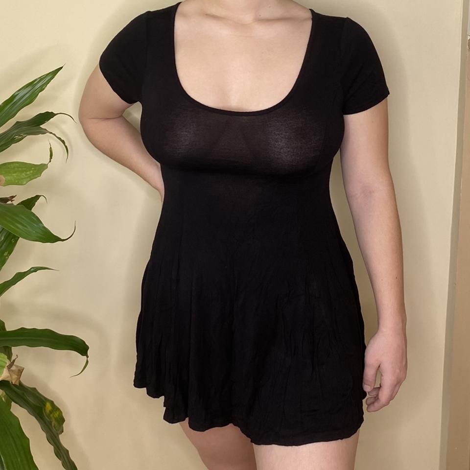 Tits out for this plain black skater dress!! Your...