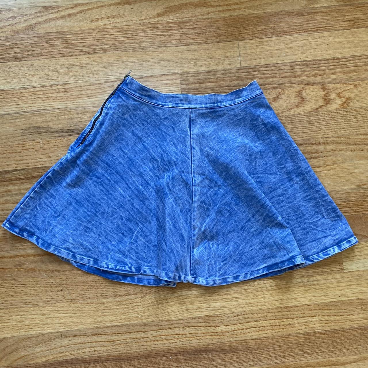 light acid wash type denim skater skirt with a cute... Depop