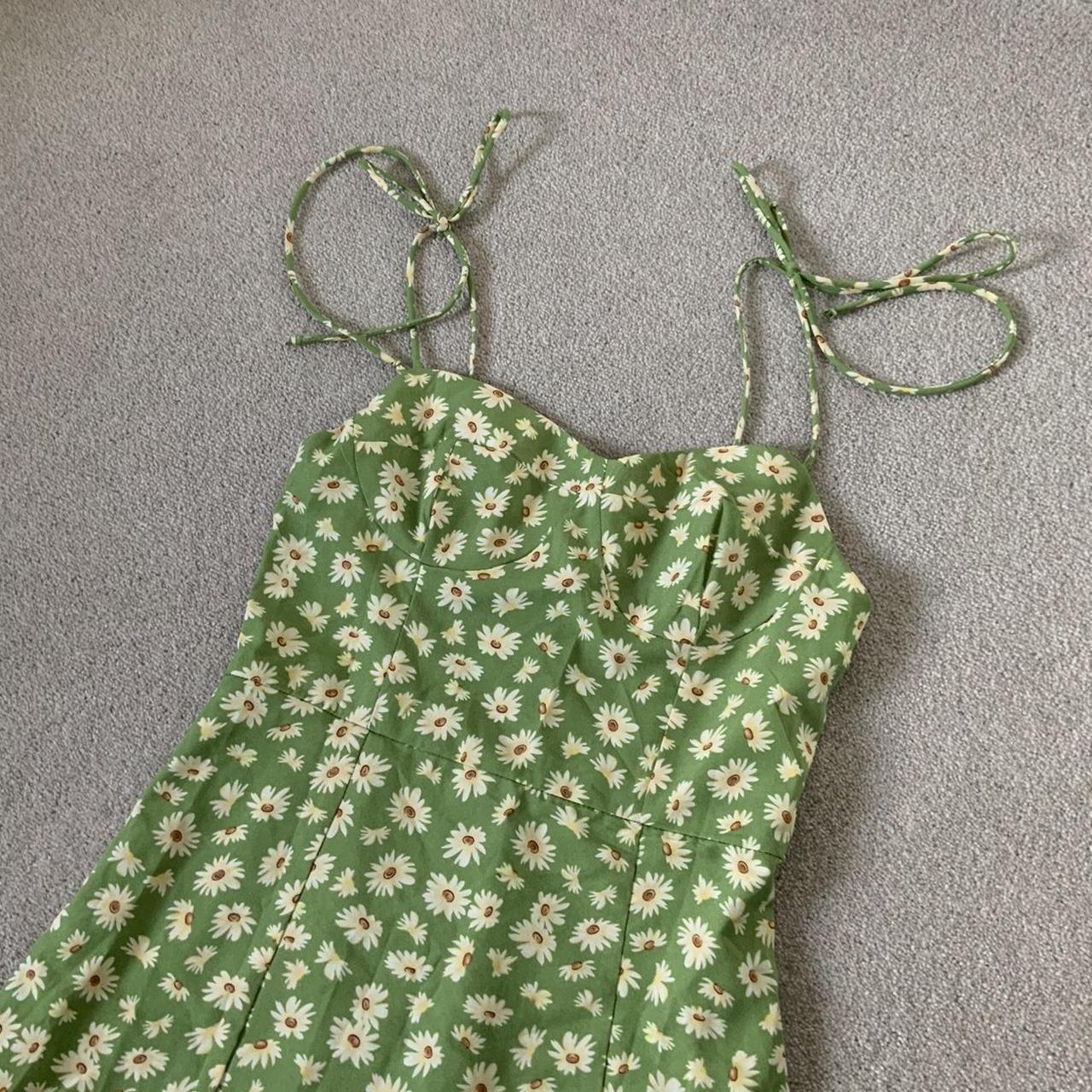 Green floral summer dress with daisies and tie strap... - Depop