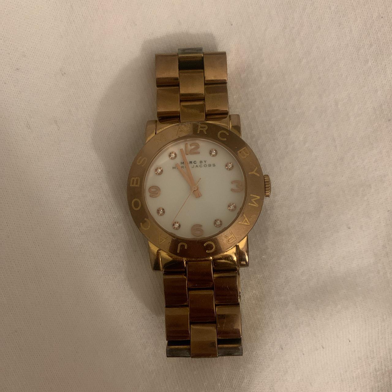 gold marc jacobs watch needs a new battery Depop