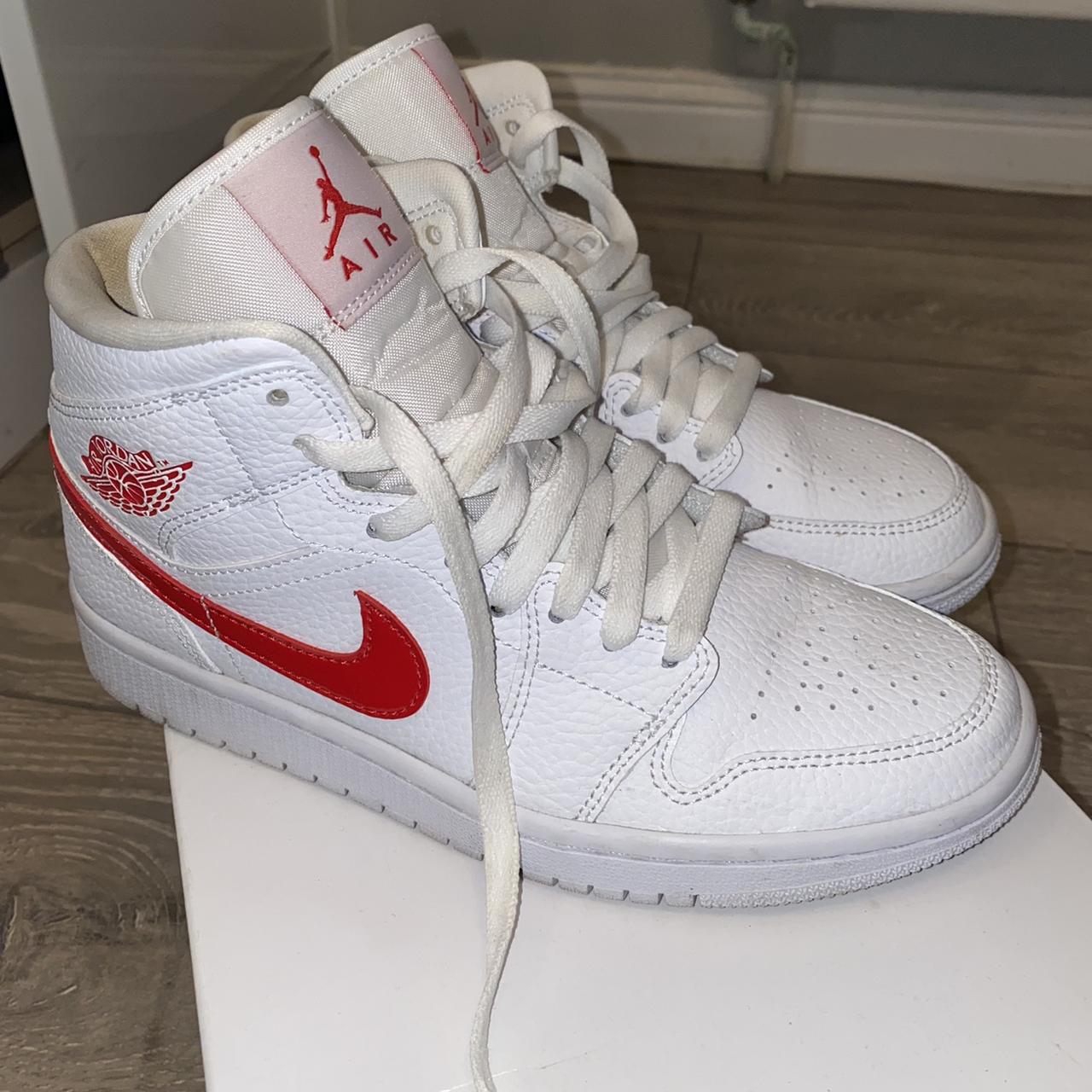 white jordans with red tick