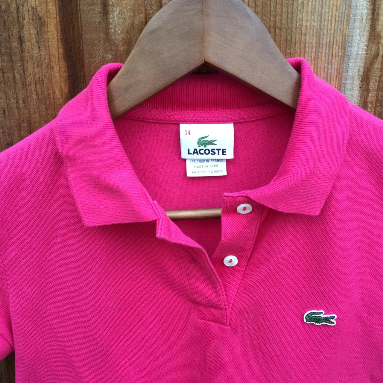 Lacoste pink/ fuchsia polo shirt. Great... -